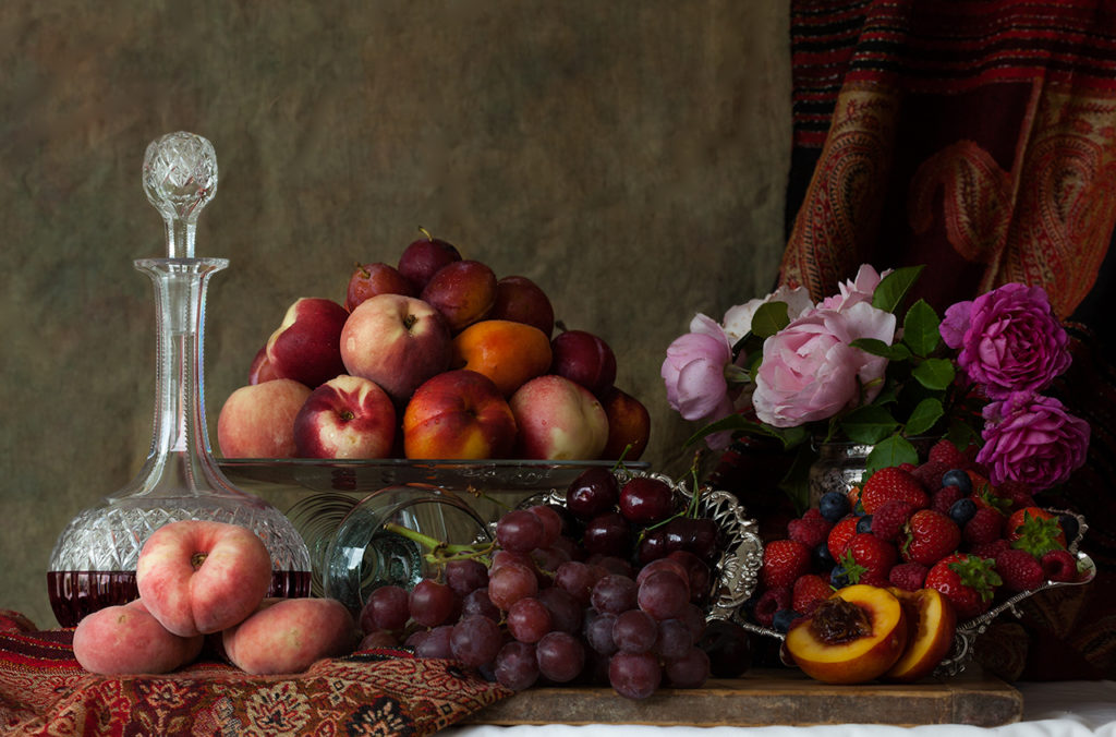 This image has an empty alt attribute; its file name is still-life-with-summer-fruits-1024x676.jpg