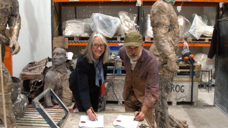 Cllr Topping and Laurence Edwards signing the agreement for a permanent sculpture in Lowestoft