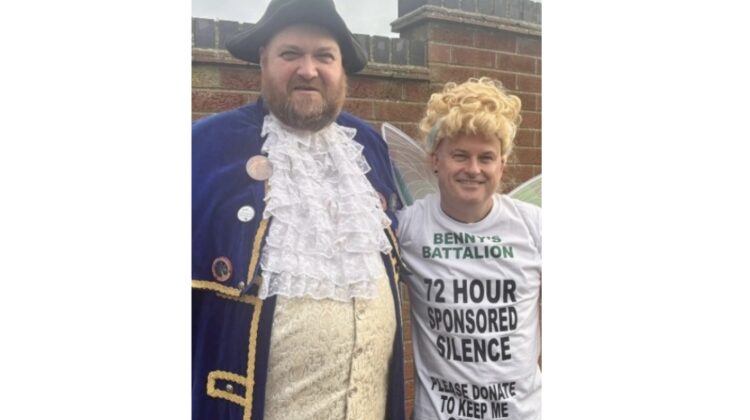 Kev Pitcher dressed as a fairy alongside the Town Crier of Sheringham