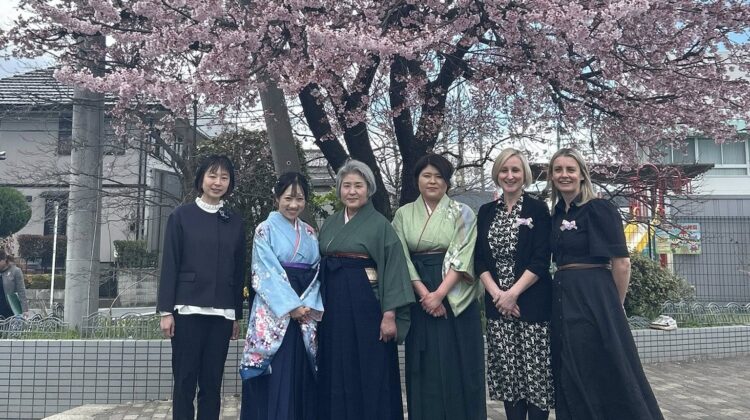 Caroline Henry and Amy Whitby (right) with counterparts from the Kindergarden.