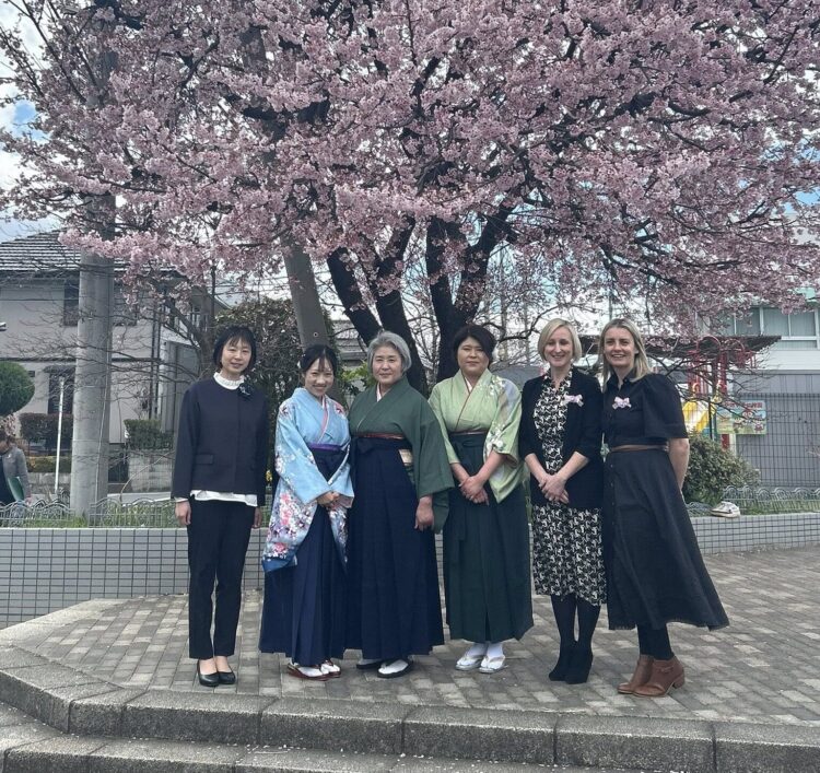 Caroline Henry and Amy Whitby (right) with counterparts from the Kindergarden.