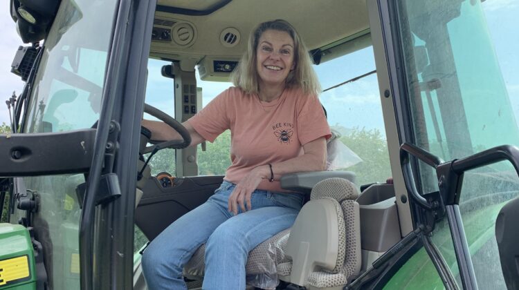 Lindy O'Hare driving tractor