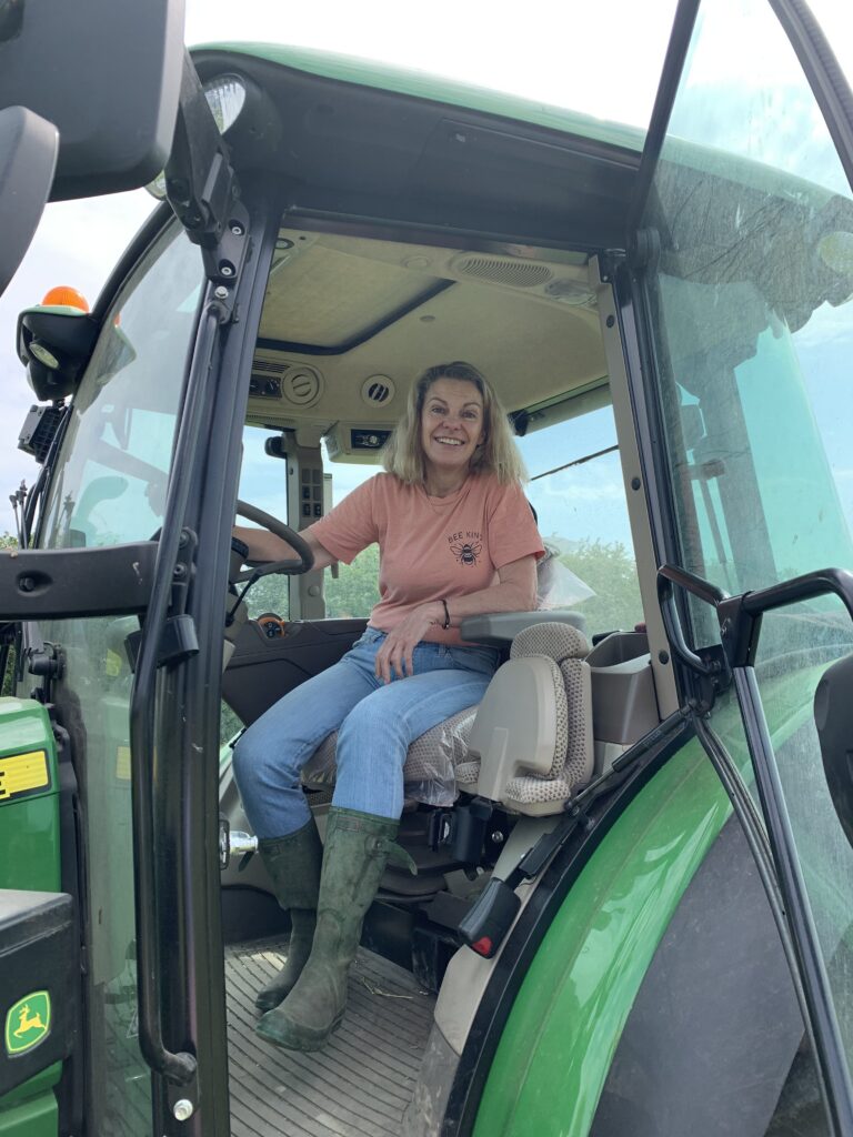 Lindy O'Hare driving tractor
