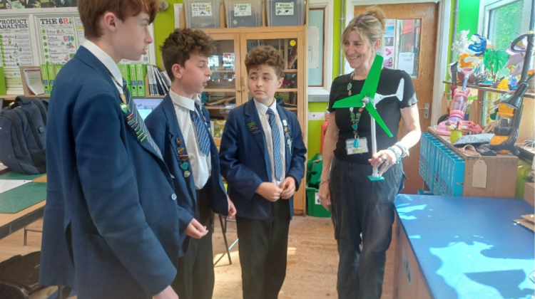 Amanda Moffat shows pupils a model turbine at the school’s STEM club